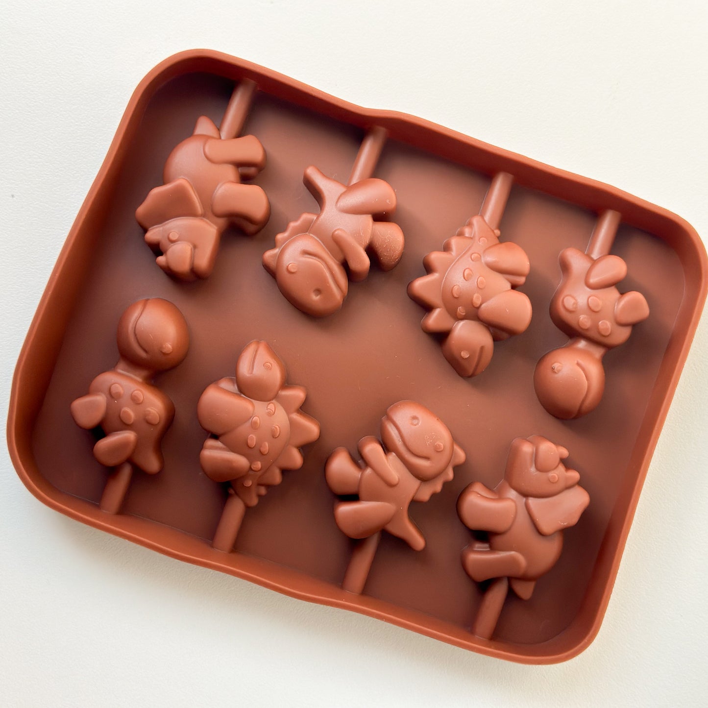 Molde DinoPop – Forma de Silicone para Pirulitos de Chocolate/Gelatina